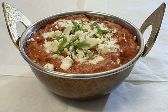 Tikka Chicken masala + Plain Naan + One Drink (Mango Lassi/Cold Drink)